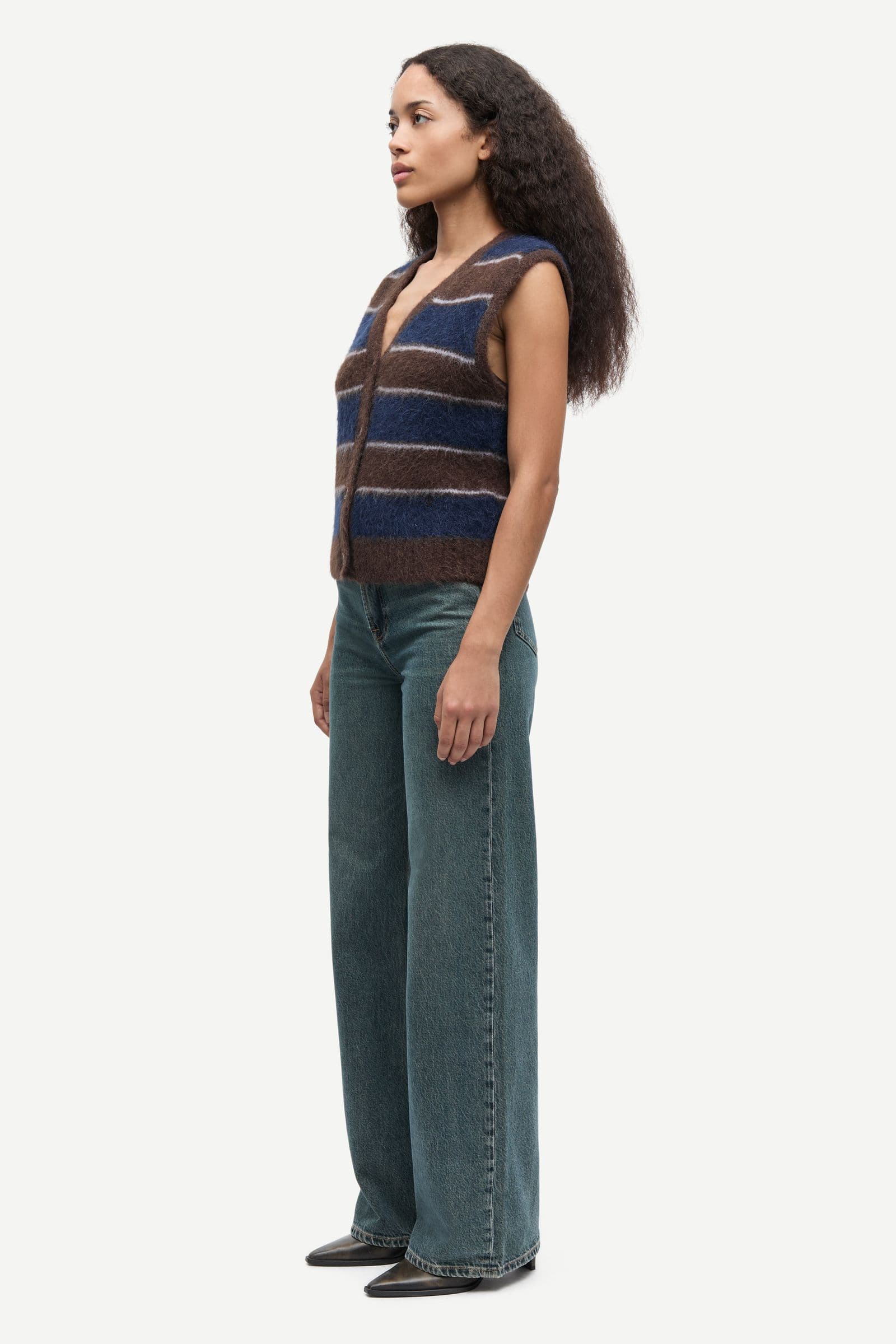 Sajeanne vest 15425 Black Coffee St.