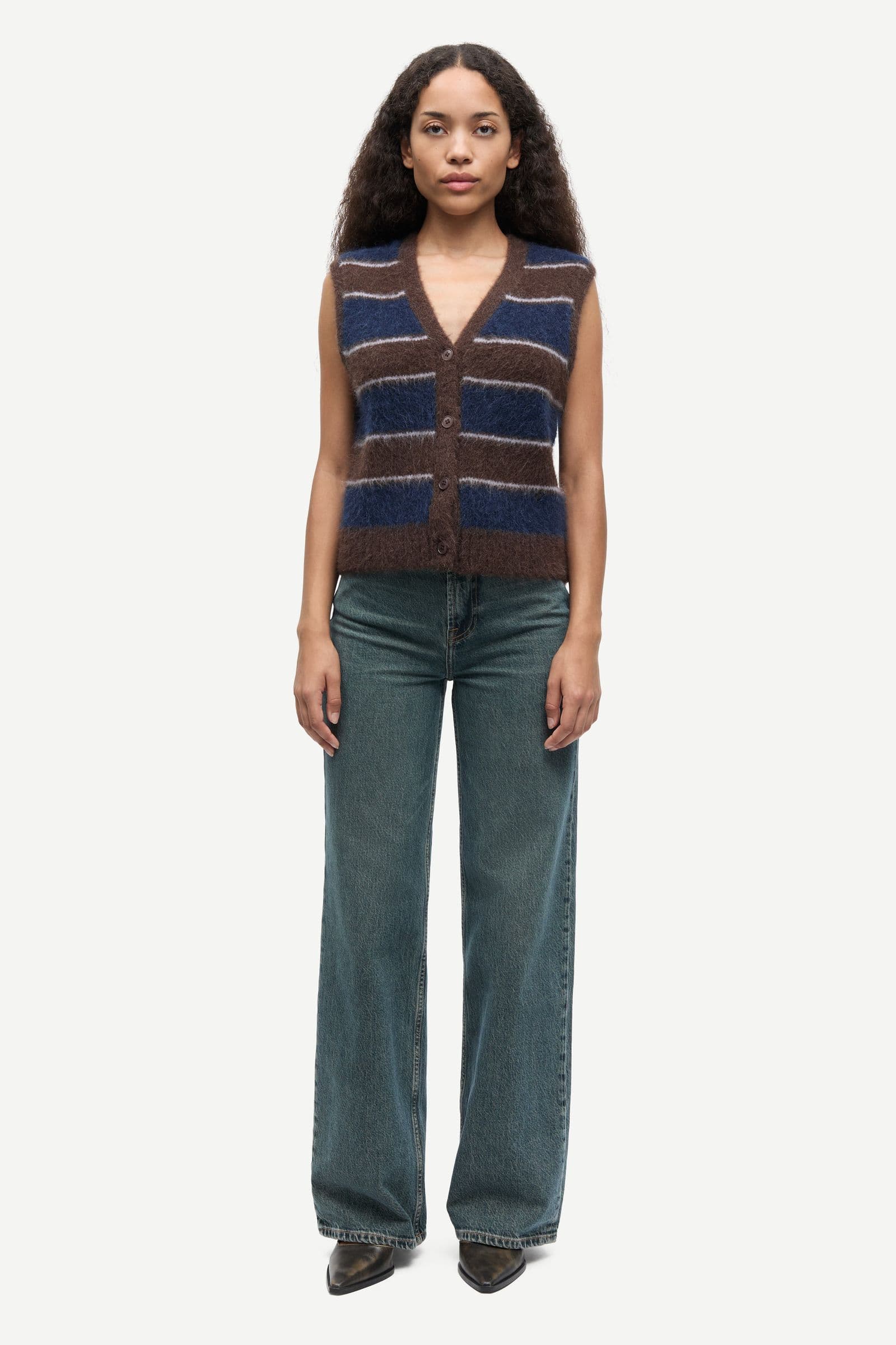 Sajeanne vest 15425 Black Coffee St.